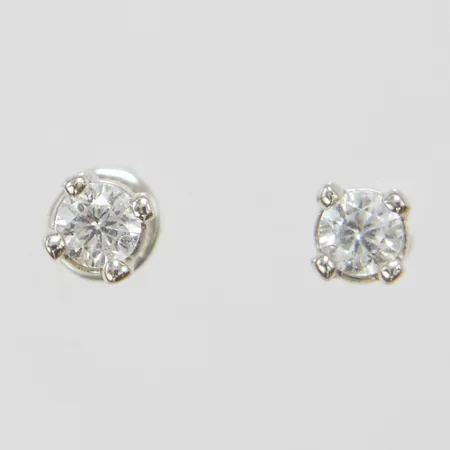 Ett par örhängen, briljantslipade diamanter 2 x ca 0,10ct, ryska stämplar, vitguld, skruvstift, saknar stopp, 14K Vikt: 0,9 g