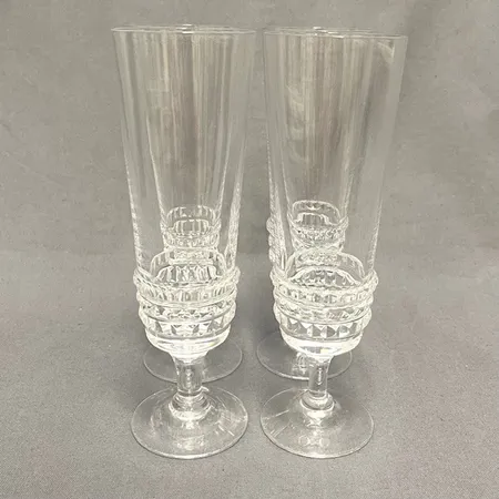 Fyra champagneglas, "Silvia", glas, formgivna av Ingeborg Lundin för Orrefors, höjd ca 17cm.  Skickas med postpaket.