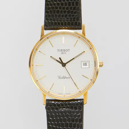 Herrur Tissot Goldrun 18K, quartz, datum, Ø 33mm, gravyr, läderarmband, behov av batteribyte, bruttovikt: 28,1g