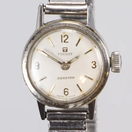 Damur Tissot Seastar Ø19mm, manuell uppdragning, plastglas med repor, flexlänk, ca 1960-tal 