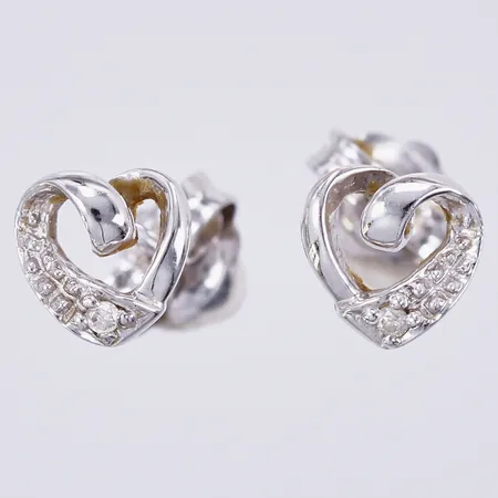 Ett par örhängen hjärtan med diamanter 2 x ca 0,01ct, Ø ca 6mm, 18K  Vikt: 1,1 g