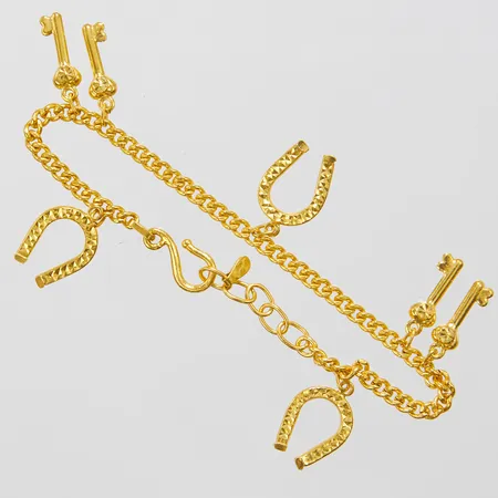 Armband Pansar, sju berlocker, längd ca 15-16,5cm, bredd 2,5-18mm, thaiguld 1/2 baht, 23K Vikt: 76 g