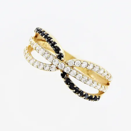 Ring, svarta/vita stenar, stl 18, bredd 2-8mm, 18K.  Vikt: 2,8 g