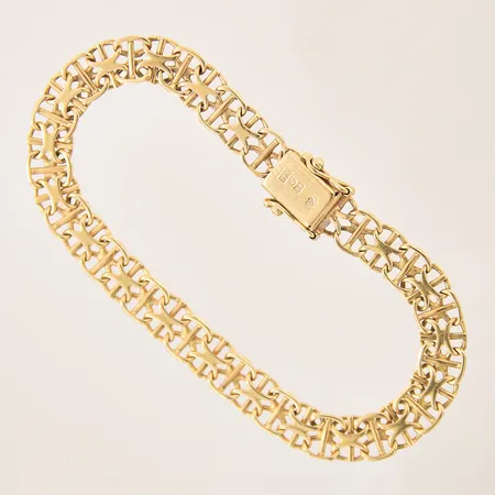 Armband X-länk med stav, längd 20cm, bredd 7,5mm, smärre buckla, 18K Vikt: 14,3 g