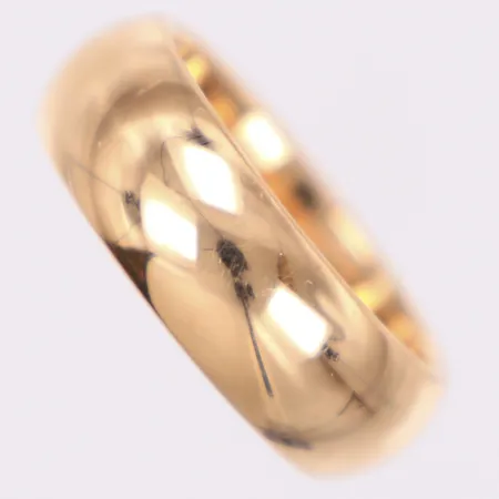 Ring, slät, stl 17¼, bredd 6,9mm, ograverad, 18K Vikt: 11,8 g