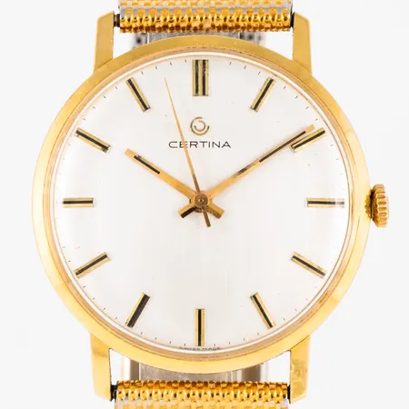 Herrur Certina i 18K guld, band i metall. Boett Ø 34 mm med gravyr "För nit...". Manuell. Repor och sprickor i glas. Vikt: 0 g