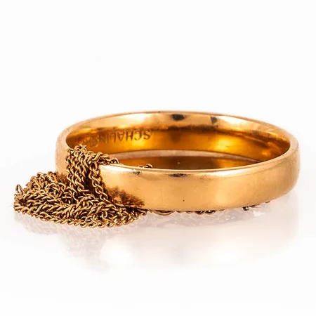 Diverse defekt/graverat guld i 18K. Vikt: 8,3g.