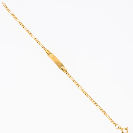 Armband i 18K guld med graverad gravyrbricka. Det är 17,5 cm långt, 2,5 - 5 mm brett och väger 3,3g. Gravyr "Oliver". Springring.