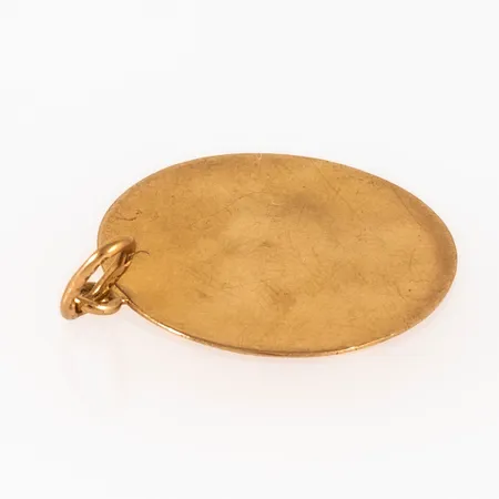 Graverat guld i 18K guld. Vikt: 1,7g.