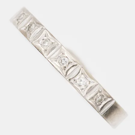 Ring med åttkantsslipade diamanter, totalt 0,06ct, stl: 16¼, 18K vitguld Vikt: 3,2 g