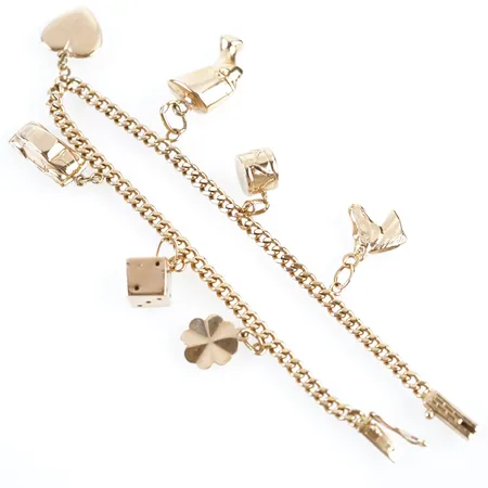 Armband m 7 berlocker, pansar, 19cm, bredd 3,5mm, 18k, fint skick Vikt: 13,3 g