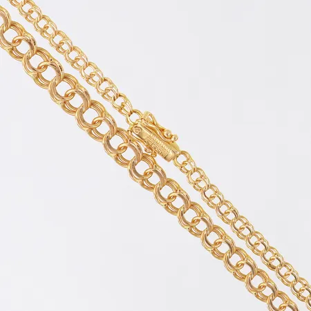 Collier Bismarck, doserad, längd 47cm, bredd 3,5-6mm, 18K.  Vikt: 14,4 g