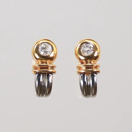 Ett par örhängen tvåfärgade med vita stenar, 14x6mm, 18K 3,1g totalt. 
