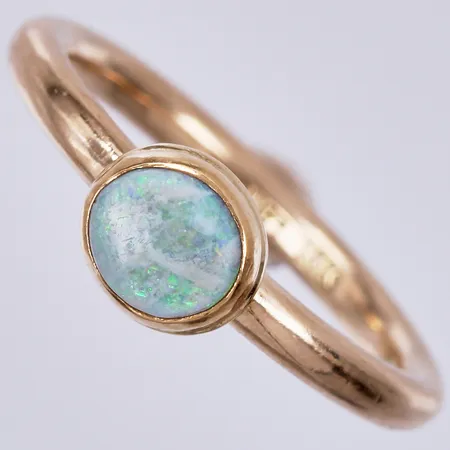 Ring, opal, stl: 17¾, bredd: ca 2-6mm, Burt Edman, 18K Vikt: 5 g
