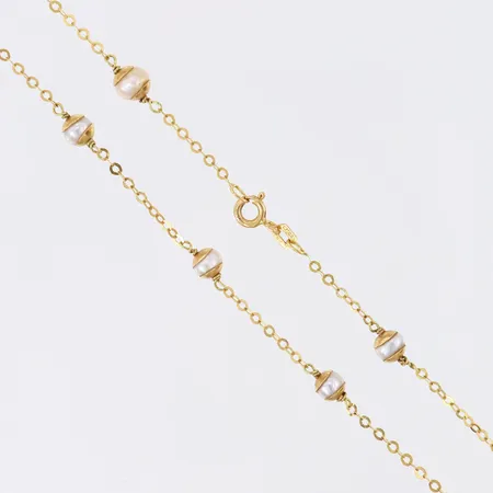 Collier med integrerade odlade pärlor, längd 43cm, bredd 1-5mm, 18K.  Vikt: 5 g