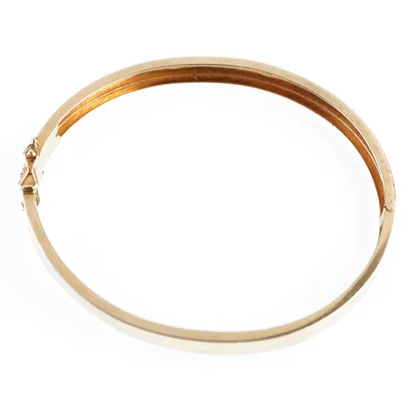 Armring, innermått 18cm, bredd 7mm, 18k Vikt: 9,4 g