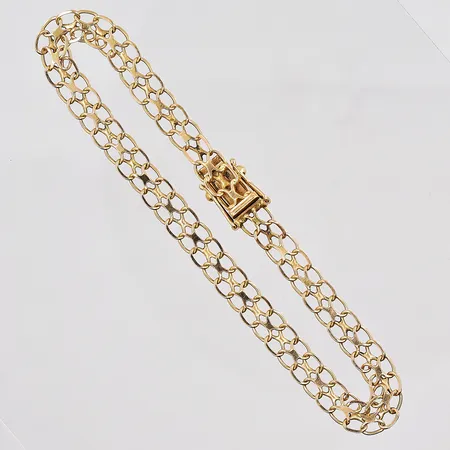 Armband X-länk, 19cm, bredd 5,7mm, sliten länk, 18K Vikt: 6,5 g