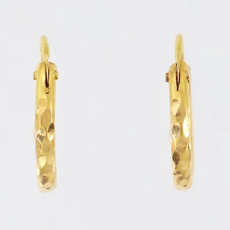 Ett par örhängen, creloer, Ø12,5mm, bucklig 18K.  Vikt: 1,6 g
