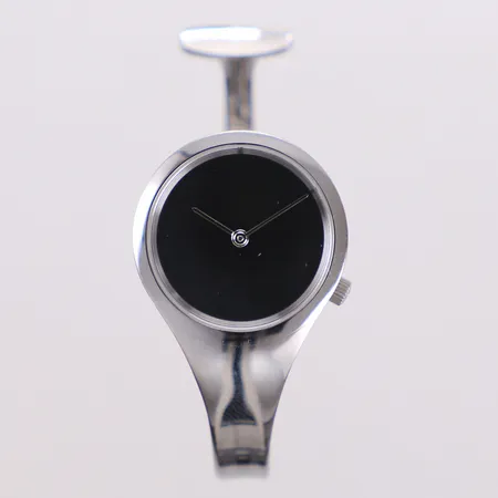 Damur, modell Vivianna, Ref 336, 3575052, design Torun Bülow-Hübe 1969 för Georg Jensen, Ø26,5mm, quartz, spegelglas, bygel, stål, stl M, omkrets 150mm, ser nr 004375, cert år 2013, bruksrepor, originalbox