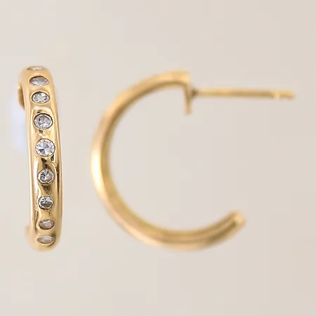 Ett par örhängen med diamanter 20 x ca 0,02ct, Ø18mm, bredd 3mm, saknar snurrebussar, ostämplade, 18K Vikt: 3,6 g