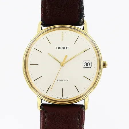 Herrur Tissot, 14K, quartz, Ø33mm, vit urtavla, datum, sekundvisare, läderband med slitage, ej original, repor på glas, i behov av batteribyte, bruttovikt 28,5g, inga tillbehör.