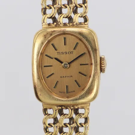 Damur Tissot Saphir, 17,4mm, manuell, 18K, med Bismarcklänk, år 1970, längd 17cm, bredd 10,5mm, 18K. Bruttovikt 27,5g