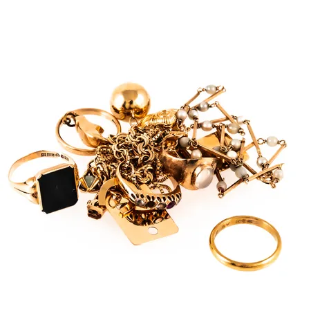 Diverse defekt/graverat guld. 37,0g i 18K & 4,5g i 23K brutto. 