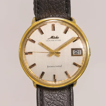 Herrur Mido Oceanstar Powerwind, 35mm, guld på stål, automatisk, sliten, bucklor, läderband.