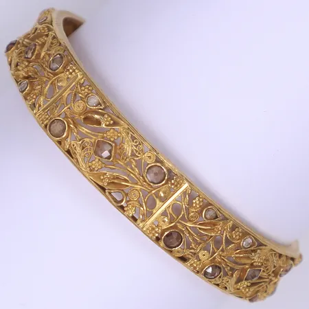 Armring med bruna glasstenar, Ø65mm, bredd 13mm, bucklig/defekt, 22K Vikt: 34 g