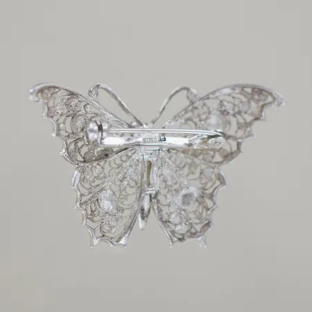 Brosch filigran, höjd 3 cm, bredd 5 cm, silver 830 Vikt: 7,9 g