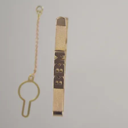 Slipshållare, längd 5,5 cm, bredd 5,5 mm, defekt 18K7875 Vikt: 11,6 g