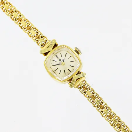 Damur Tissot, 18K, manuell, 16x16mm, länk i X-länksmodell 17,5cm, bruttovikt 18,3g, fungerar ej, inga tillbehör.