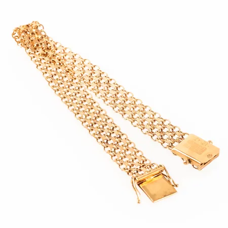 Armband X-länk i 18K guld. Det är 19 cm långt, 10,9 mm brett och väger 14,0g. Kistlås. Stämplad S9, NSE, 18K & kattfot. Säkerhetsåtta i behov av lödning. Gravyr. 