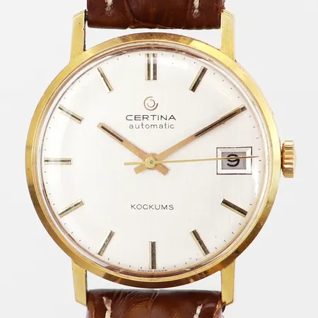 Herrur Certina, Kockums, 18K i boett, automatisk, Ø34mm, vit urtavla, datum, #5810 164, serie nr: 179325, läderband, 23,5cm, bruttovikt: 43,1 gram