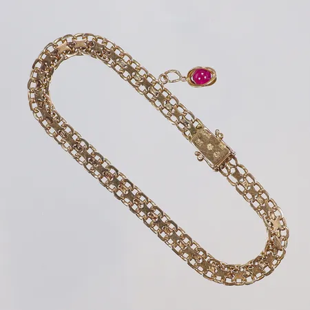 Armband x-länk med berlock, 20cm, bredd 6mm, JLH (Hultman A/B J L, Stockholm 1947), 18K  Vikt: 13,4 g