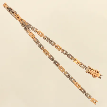 Armband, tvåtonad, defekt, av 18K Vikt: 11 g