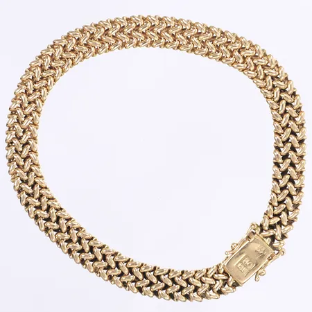 Armband, 20,5cm, bredd 7,5mm, kattfotsstämplad, 18K Vikt: 17,6 g