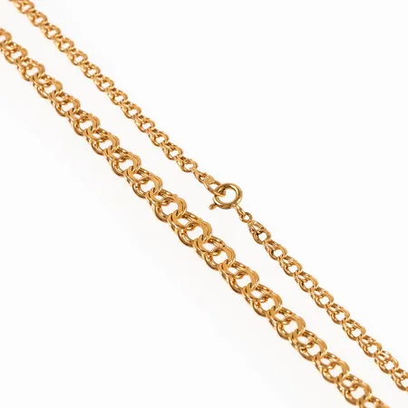 Collier doserad Bismarck i 18K. Det är 45 cm långt, är 3,5 - 6,5 mm brett och väger 12,2g. Springring. 