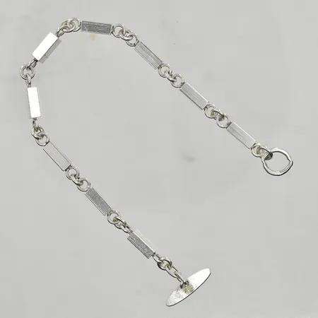 Armband, längd 18½ cm, bredd 3 mm, T-lås, silver. Vikt: 15,4 g