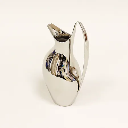 Grädd/mjölkkanna, Georg Jensen, formgivare Henning Koppel, 16cm, 0,2L, blankpolerat stål.
