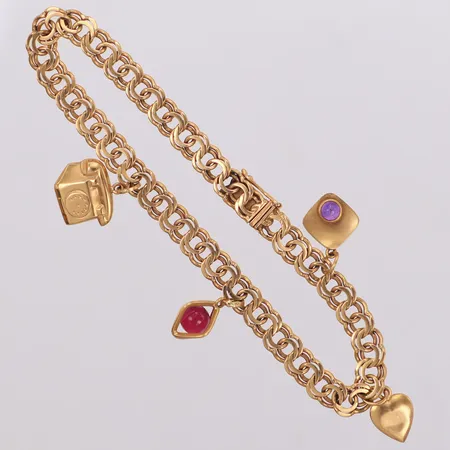 Armband Bismarck med fyra berlocker, längd 20,5cm, bredd 6,1mm, 18k Vikt: 14 g