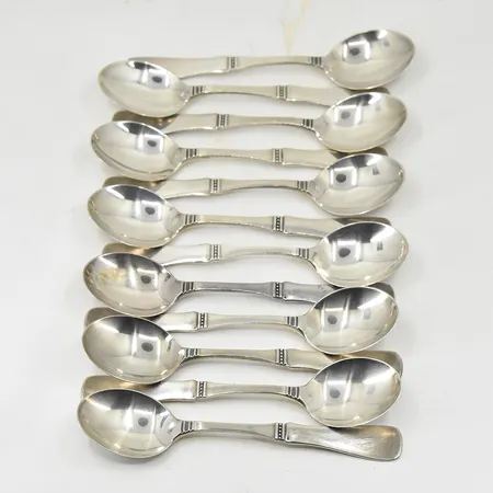 12 kaffeskedar, modell Uppsala, längd 11 cm, MGAB, 830/1000 silver. Vikt: 153,5 g