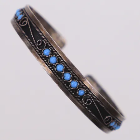 Stelt armband, öppen modell, med turkosa stenar, inre bredd ca 60mm, bredd ca 9,7mm, bucklig/skev/skadad, Silver 935/1000  Vikt: 10,4 g