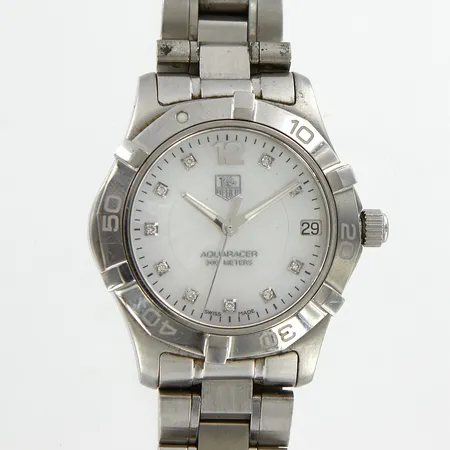 Damur Tag Heuer Aquaracer, stål, quartz, Ø33,6mm, ref: WAF1312, snr: ERA1324, pärlemorurtavla med diamantindex, datum, stållänk ca17cm, viklås, bruksrepor, personlig gravyr, inga tillbehör, 