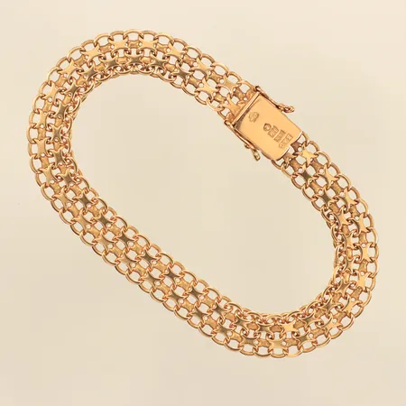 Armband X-länk, längd 18,5cm, bredd ca 9mm, Esto Agenturer Förening U P A, ca år 1959, 18K Vikt: 14,1 g