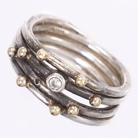 Ring med vit sten, kulor i 14K, stl 17¼, bredd 5-8mm, tillv. HHN Hans Henrik Nygaard, Danmark, slitage, en kula borta, silver 925/1000 Vikt: 5,5 g