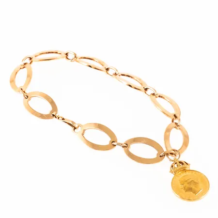 Armband i 18K guld med en förtjänstmedalj "FÖR LÅNGVARIG UPPSKATTAD ARBETSINSATS". Det är 20 cm långt, 11 mm brett och väger 19,1g. Kroklås. Tillverkat 1989 av  Borgila. Namn- och årsgravyr under en länk.