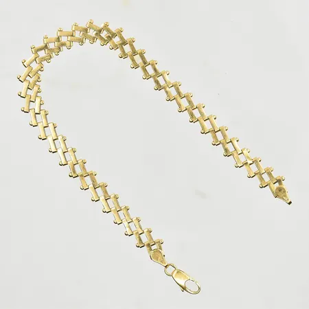 Armband, ledad modell, längd 20 cm, bredd 7 mm, 18K. Vikt: 10,2 g