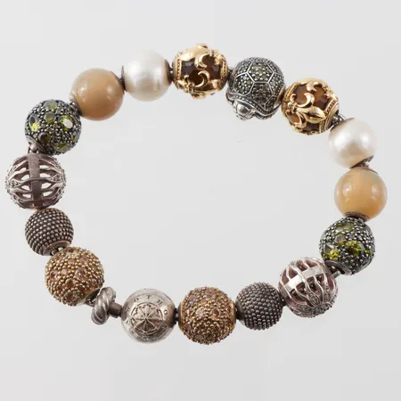 Armband Thomas Sabo med berlockpärlor 15st, längd ca 18 cm Vikt: 39 g