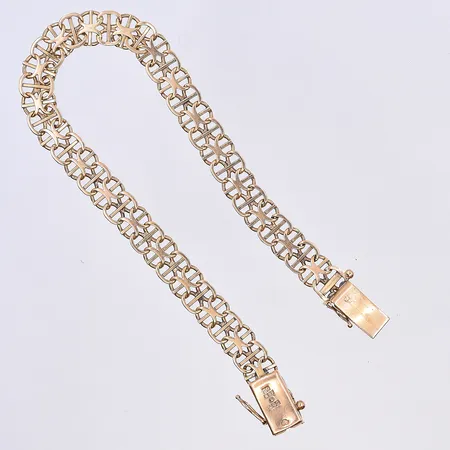 Armband X-länk, längd 19,5 cm, bredd 7 mm, 18K. Vikt: 10,9 g